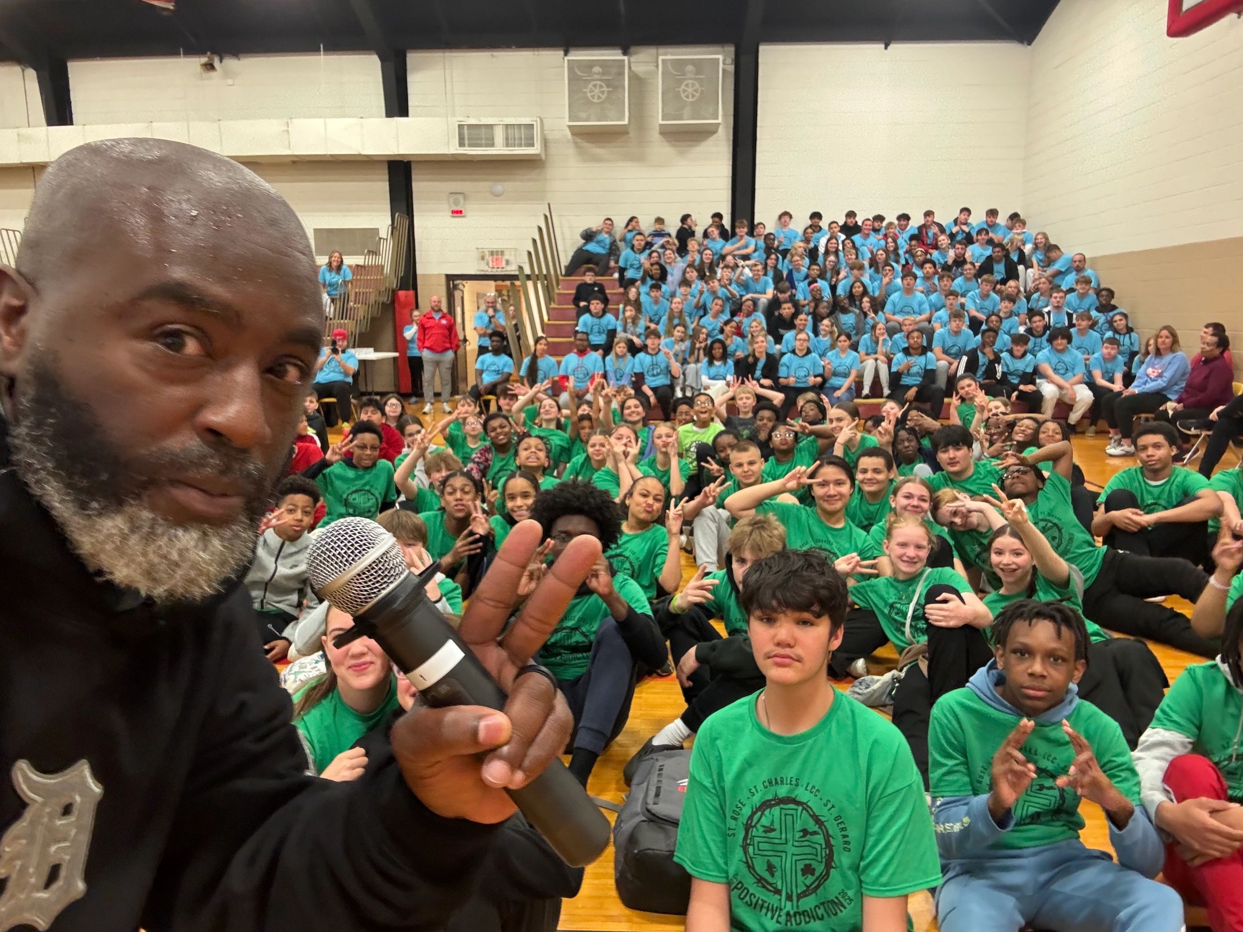 Dr. Jesse W. Jackson III speaking at a school assembly
